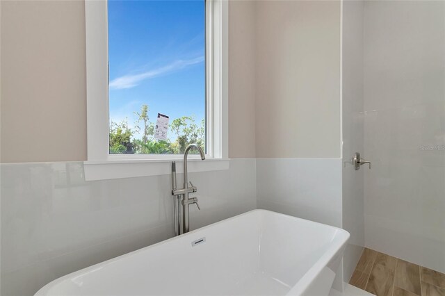 bathroom featuring hardwood / wood-style flooring