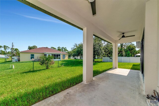 view of patio / terrace featuring ceiling fan