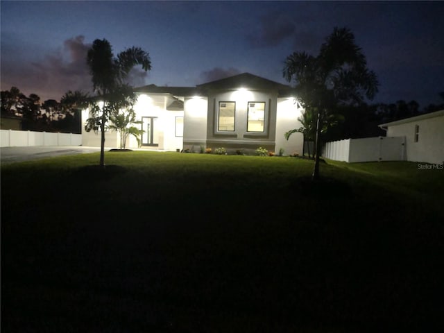 view of front of home with a front yard