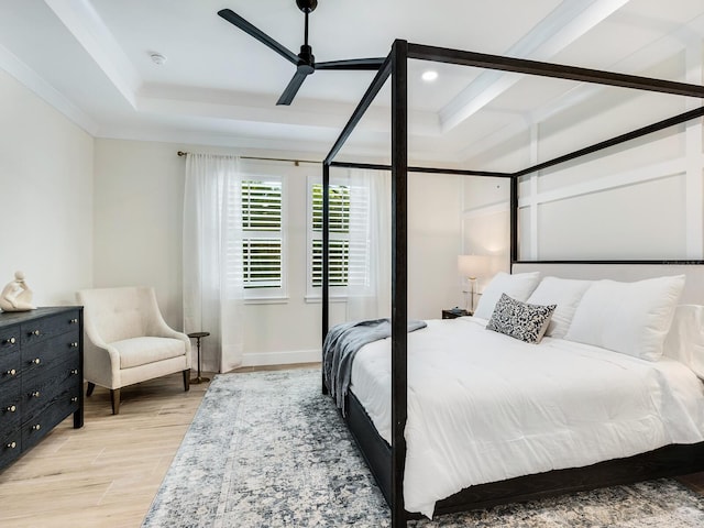 bedroom featuring ceiling fan and light hardwood / wood-style floors