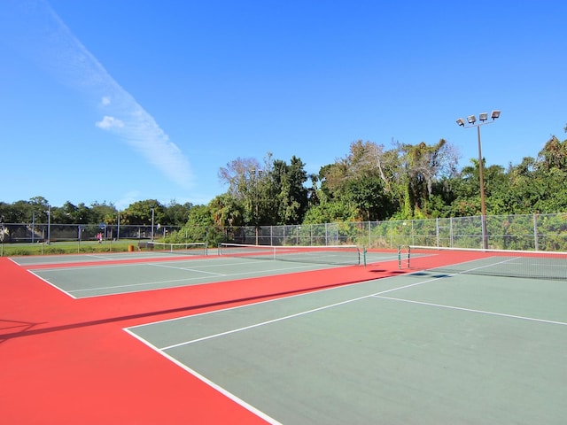 view of tennis court with basketball court