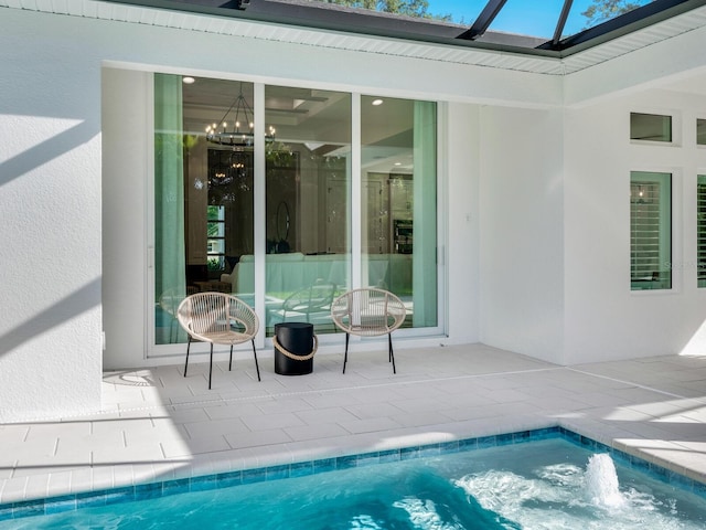 view of pool featuring a patio