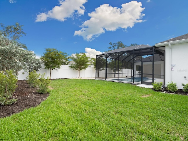 view of yard featuring a lanai