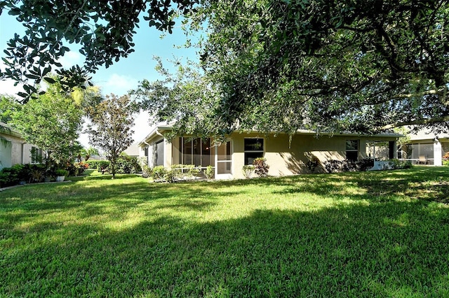 view of yard with a garage