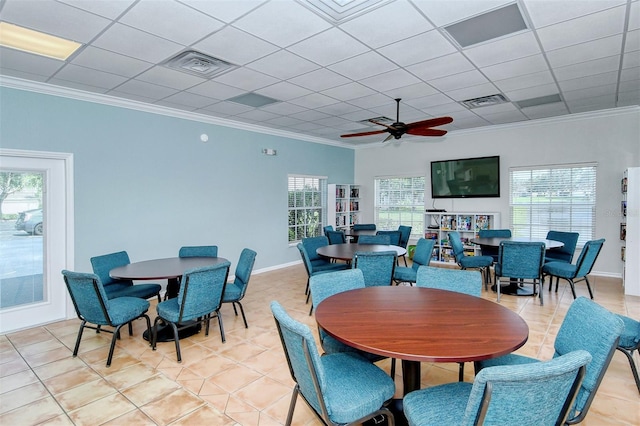 dining room with light tile patterned floors, ornamental molding, visible vents, and a healthy amount of sunlight