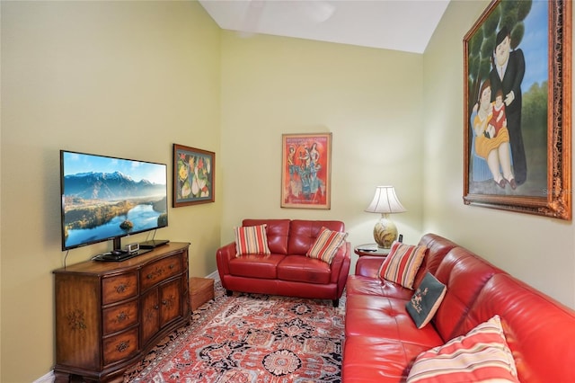 living area with lofted ceiling