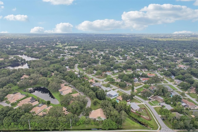 aerial view featuring a residential view and a water view