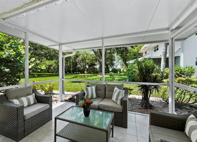 sunroom / solarium featuring a healthy amount of sunlight