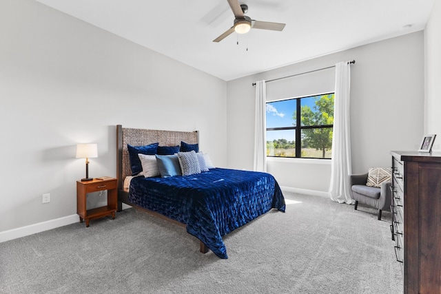 bedroom with light carpet and ceiling fan