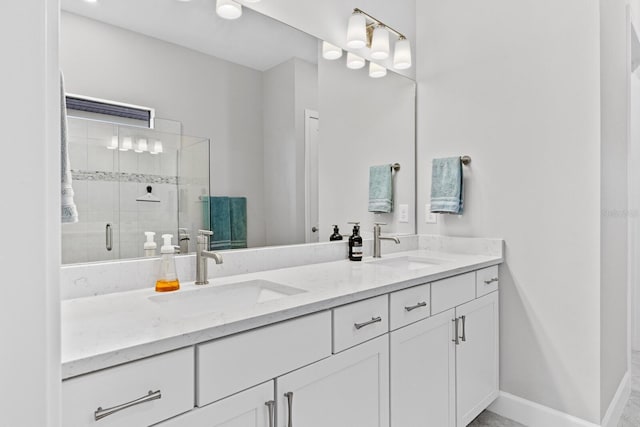 bathroom with an enclosed shower and vanity