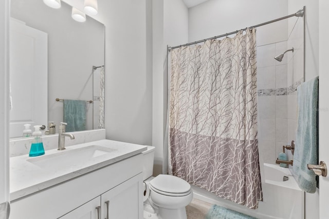 full bathroom featuring toilet, shower / tub combo with curtain, and vanity