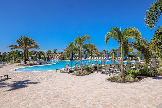 view of pool featuring a patio and pool water feature