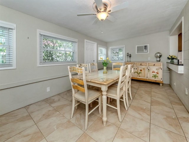 dining space with ceiling fan