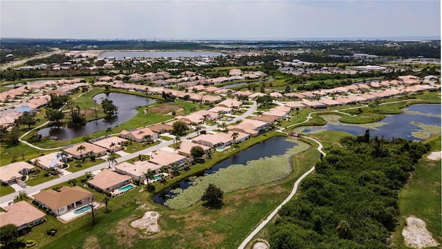 aerial view with a water view and a residential view