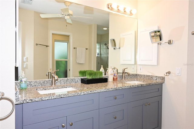 bathroom with vanity and ceiling fan