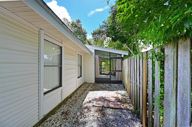 view of yard featuring a sunroom