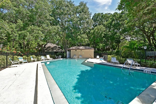 view of swimming pool featuring a patio area