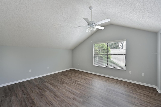 bonus room featuring ceiling fan, vaulted ceiling, a textured ceiling, and wood-type flooring