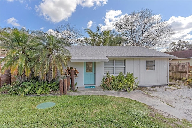 view of front of home with a front lawn