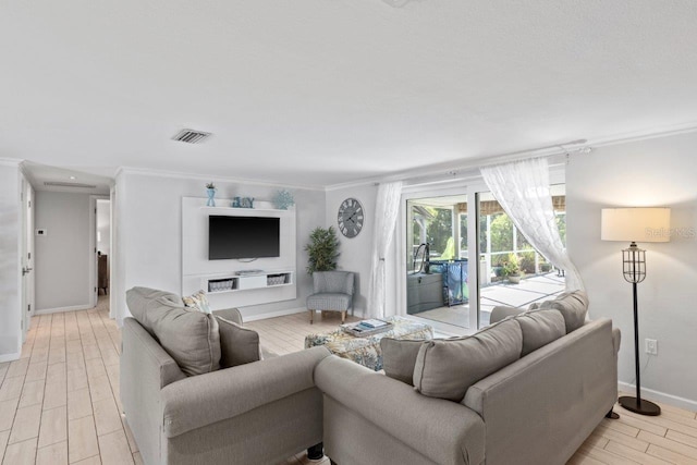 living room featuring crown molding and light wood-type flooring