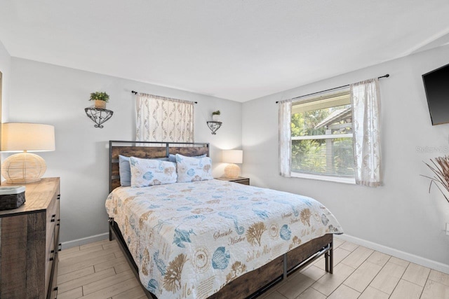 bedroom with light hardwood / wood-style flooring