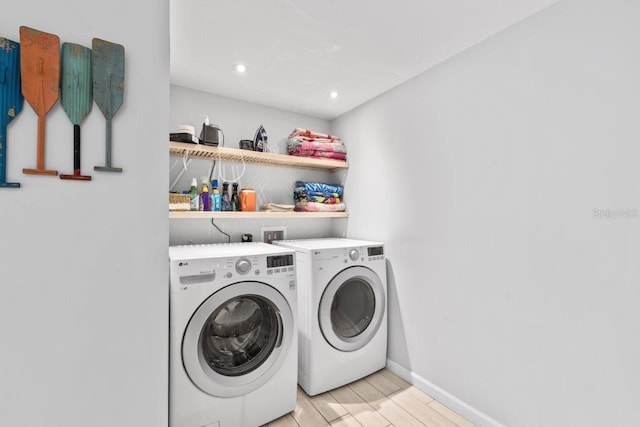 laundry room with washer and dryer