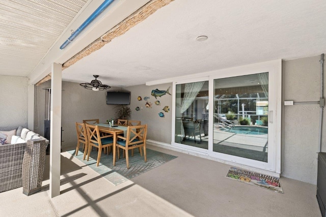 view of patio with ceiling fan