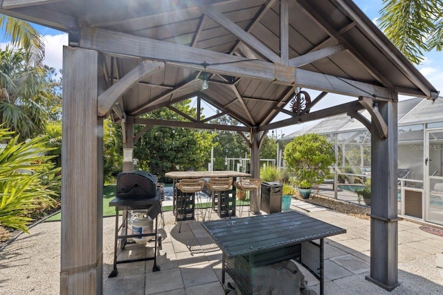 view of patio / terrace with a gazebo and a lanai