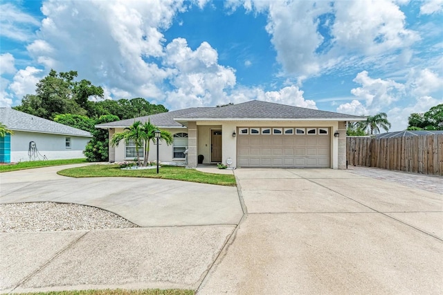 single story home with a garage