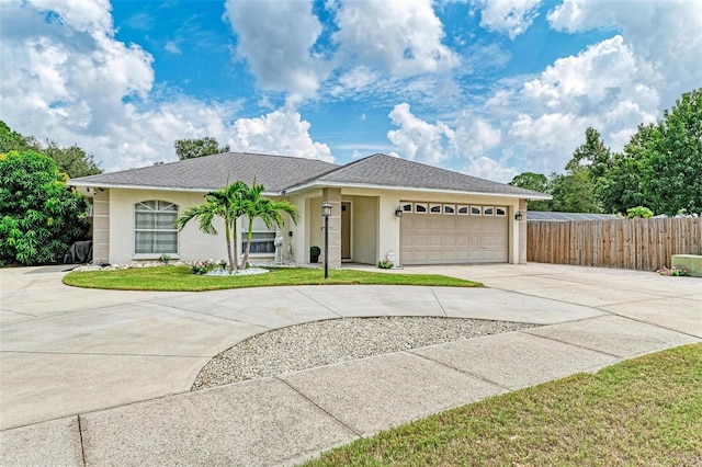 ranch-style home with a garage