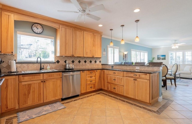 kitchen with dishwasher, sink, kitchen peninsula, decorative light fixtures, and light tile patterned floors