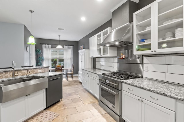 kitchen featuring tasteful backsplash, light tile patterned flooring, stainless steel appliances, and white cabinetry