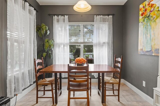 view of tiled dining space