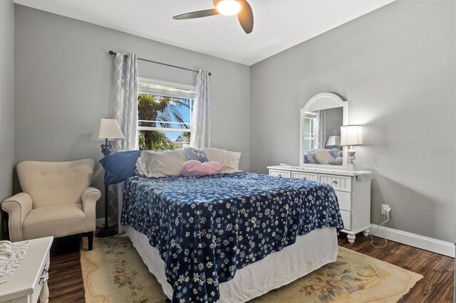 bedroom featuring ceiling fan and hardwood / wood-style flooring