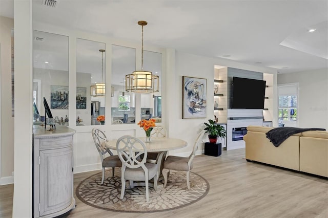 dining room featuring light hardwood / wood-style floors