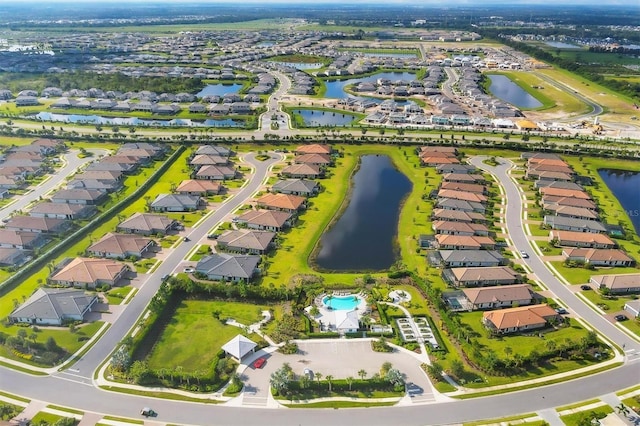 drone / aerial view with a water view