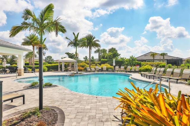 view of pool featuring a patio and a gazebo