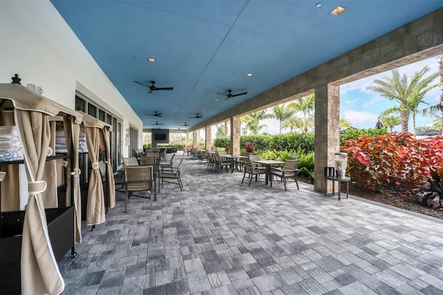 view of patio / terrace featuring ceiling fan