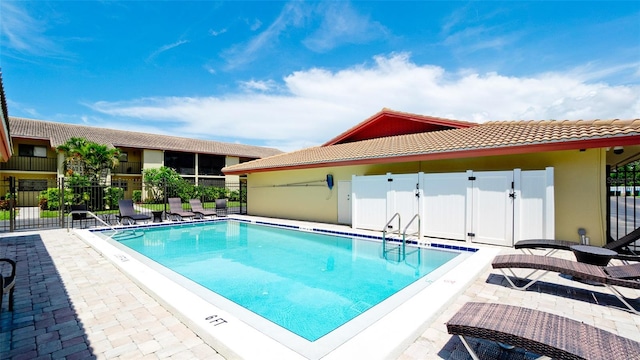 view of pool featuring a patio area