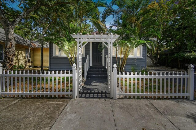 view of front of home featuring a pergola