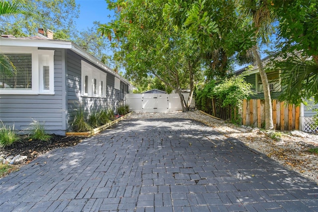 view of side of property with a patio