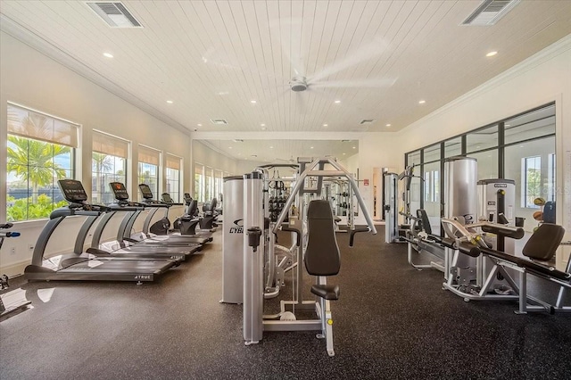 workout area featuring plenty of natural light, wooden ceiling, and ceiling fan