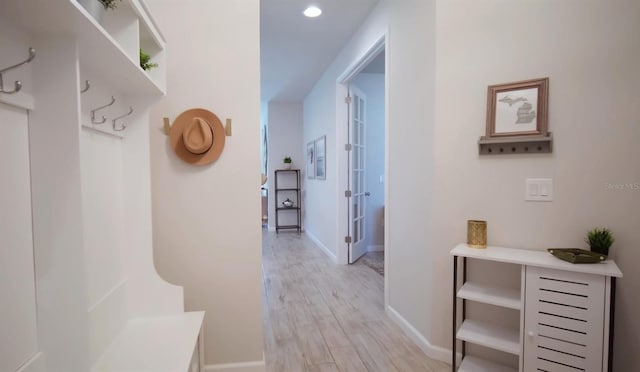 hall featuring light hardwood / wood-style flooring