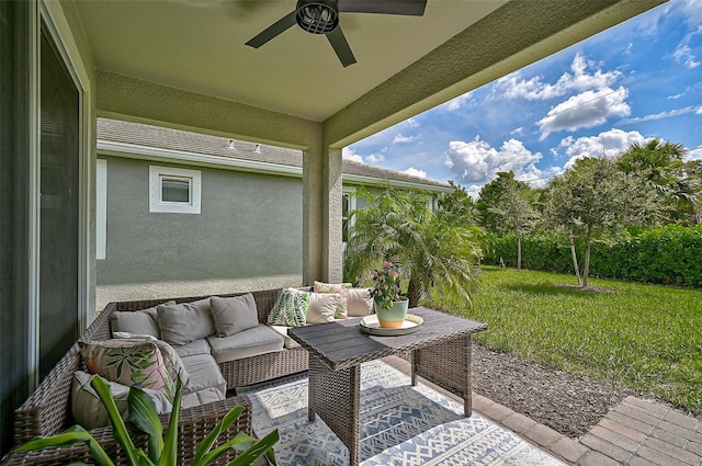 view of patio featuring ceiling fan and an outdoor hangout area