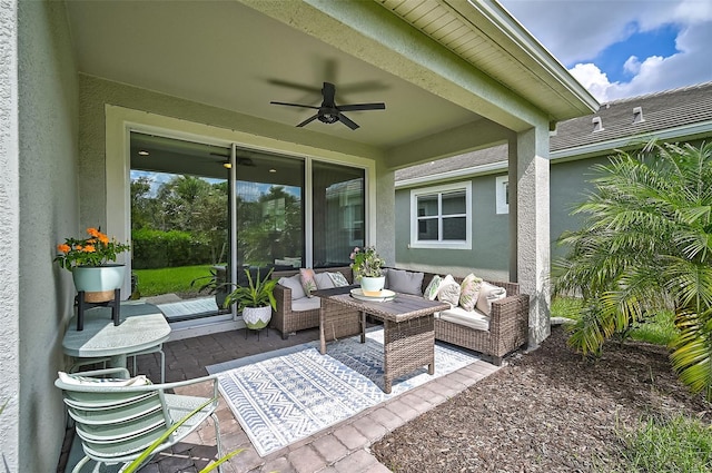 view of patio with ceiling fan and an outdoor hangout area