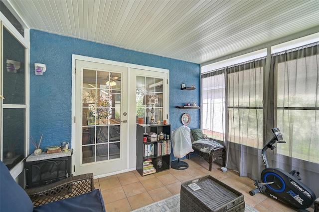 sunroom / solarium featuring wooden ceiling