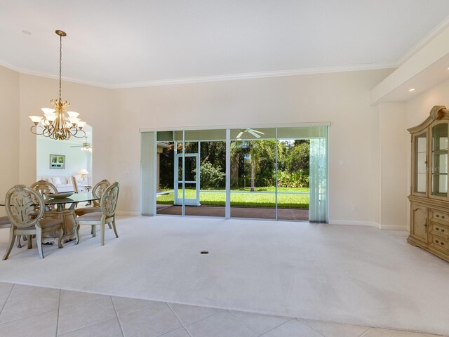 unfurnished dining area with carpet flooring, crown molding, and tile patterned floors