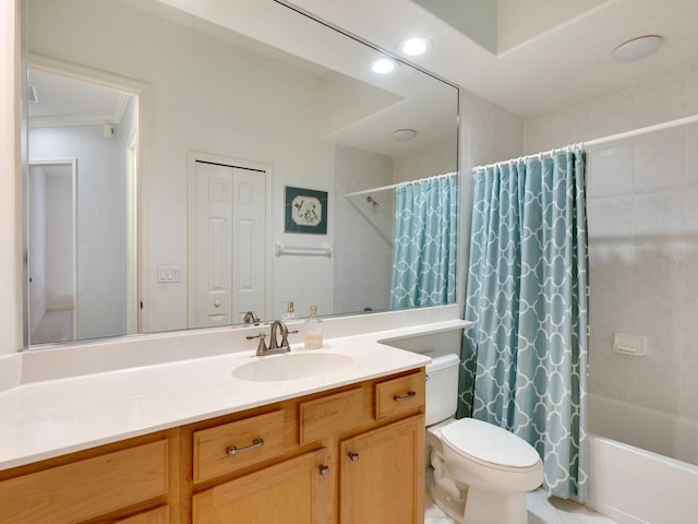 full bathroom featuring vanity, toilet, and shower / tub combo with curtain