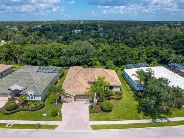 bird's eye view featuring a view of trees