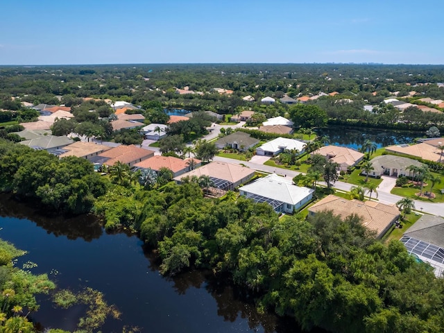 aerial view with a residential view and a water view